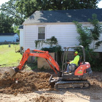 MATEM Landscaping and Construction - a man on a small excavator - Landscaping Near Me - Raleigh, North Carolina