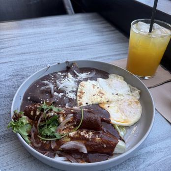 Madre - Desayuno Oaxaqueño - chicken taquito with mole, enfrijoladas, and eggs. - Mexican Near Me - Torrance, California