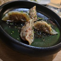 Gyoza with broth on side.   Very good