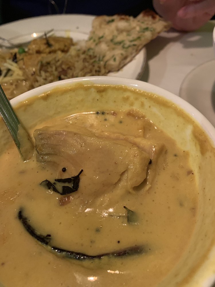 Order Amma's Fish Curry food online from Utsav Indian Cuisine store, Vernon on bringmethat.com