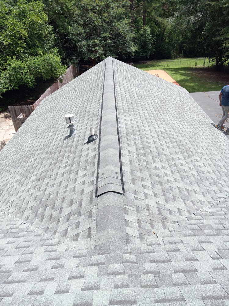 Slide of RCM Roofers