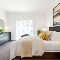 Terrain On The Parkway - Carpeted Bedroom With Ample Windows and Natural Light