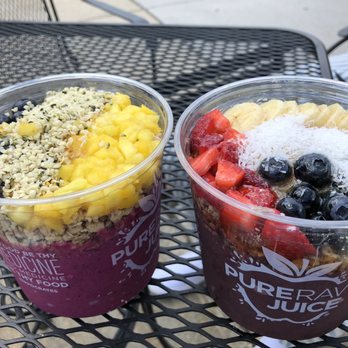 Pure Raw Juice - Lt-Pitaya bowl on with mango,granola,bee pollen, blueberries & hemp seeds. Right-açaí bowl -traditional & lt-pitaya bowl - Vegan Near Me - Baltimore, Maryland Pure Raw Juice - Lt-Pitaya bowl on with mango,granola,bee pollen, blueberries & hemp seeds. Right-açaí bowl -traditional & lt-pitaya bowl - Vegan Near Me - Baltimore, Maryland