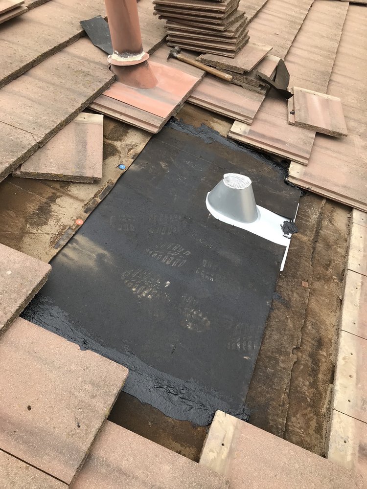 Slide of RP Roofing