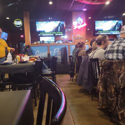 Sports Page Grill - Seating Area. Lots of TV's!!