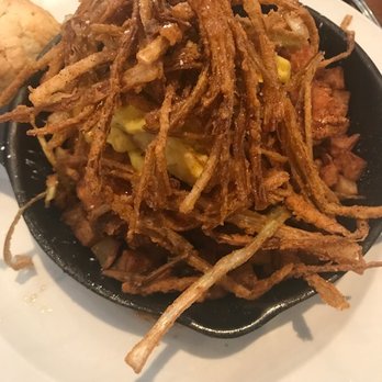 Hash Kitchen - Herb Fried Chicken - potato hash / poached eggs / fried leeks / warm maple reduction - Breakfast & Brunch Near Me - Scottsdale, Arizona