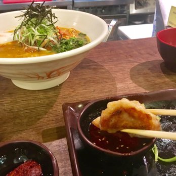 mokbar - Classic pork ramen, pork dumplings and spicy sauce on the side - Korean Near Me - New York, New York mokbar - Classic pork ramen, pork dumplings and spicy sauce on the side - Korean Near Me - New York, New York