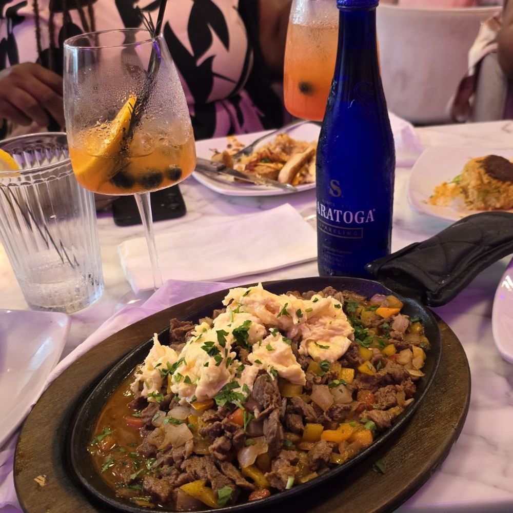 Mosa Restaurant and Bar - Steak skillet. And very expensive water - Breakfast & Brunch Near Me - Atlanta, Georgia