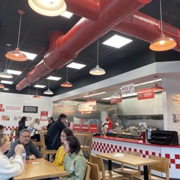 diners sitting at tables in a fast food restaurant