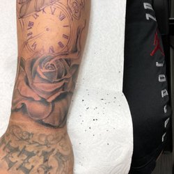 Chicano Tattoo & Piercings