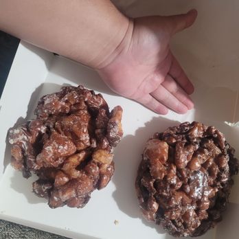 Luke’s Dixie Donuts & Fried Chicken - Size comparison of my apple fritters to my hand. - Donuts Near Me - Jupiter, Florida Luke’s Dixie Donuts & Fried Chicken - Size comparison of my apple fritters to my hand. - Donuts Near Me - Jupiter, Florida