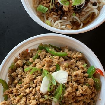 Chinese Street Market - Dan Dan noodles (top) and 13 spice scallion oil stir fried noodles (bottom) - Chinese Near Me - Washington, DC, District of Columbia Chinese Street Market - Dan Dan noodles (top) and 13 spice scallion oil stir fried noodles (bottom) - Chinese Near Me - Washington, DC, District of Columbia