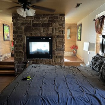 Eden Crest Vacation Rentals - Primary downstairs bedroom. - Vacation Rentals Near Me - Pigeon Forge, Tennessee