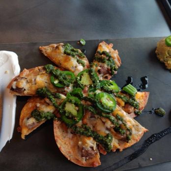 Topgolf - Top Golf's version of Nachos!!! Nachos is not a fancy dish! It's meant to be piled high & deep! WTF is this?!! - Golf Near Me - Independence, Ohio Topgolf - Top Golf's version of Nachos!!! Nachos is not a fancy dish! It's meant to be piled high & deep! WTF is this?!! - Golf Near Me - Independence, Ohio
