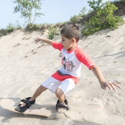 Third Coast Paddling - Warren Dunes State Park - Third Coast Paddling has rental sandboards and sand sleds available to ride the dunes at Warren Dunes State Park in Michigan.