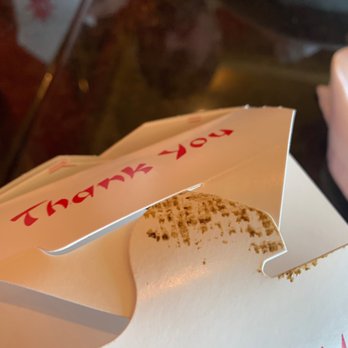 Pad Thai - filthy dried grease on the to go box. this was also on my coworker's box. i can't believe they'd hand these out - though, actually, i can. - Thai Near Me - Akron, Ohio