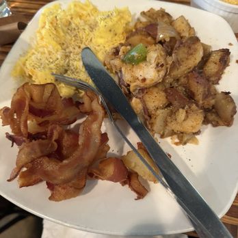 Lulu's - Bacon, 2 Eggs, any Way*, House Potatoes, and Cheese Grits - New American Near Me - Richmond, Virginia Lulu's - Bacon, 2 Eggs, any Way*, House Potatoes, and Cheese Grits - New American Near Me - Richmond, Virginia