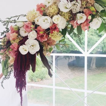 Wild Bramble Farm - a wedding arch decorated with flowers - CSA Near Me - Northfield, Massachusetts