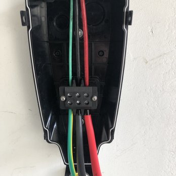 EV Pros - The main 240VAC feed being landed on the Tesla Wall connector - EV Charging Stations Near Me - Santa Ana, California EV Pros - The main 240VAC feed being landed on the Tesla Wall connector - EV Charging Stations Near Me - Santa Ana, California
