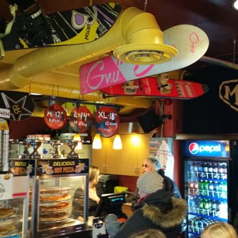 Mountain High Pizza - customers at the counter - Pizza Near Me - Sun Peaks, British Columbia