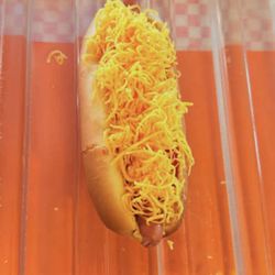 Nano's Ohana Cafe - This is what a cheese dog should look like! Not toasted just a basic Casper dog, fresh bun and overload of fresh grated cheese.
