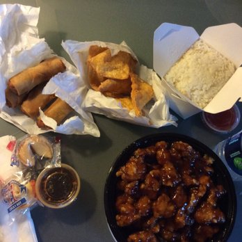 The Show Restaurant - Orange chicken, bottled water, egg rolls and crab puffs. - Chinese Near Me - Corvallis, Oregon