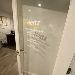 Hertz Rent A Car - Inside the building. Office hours