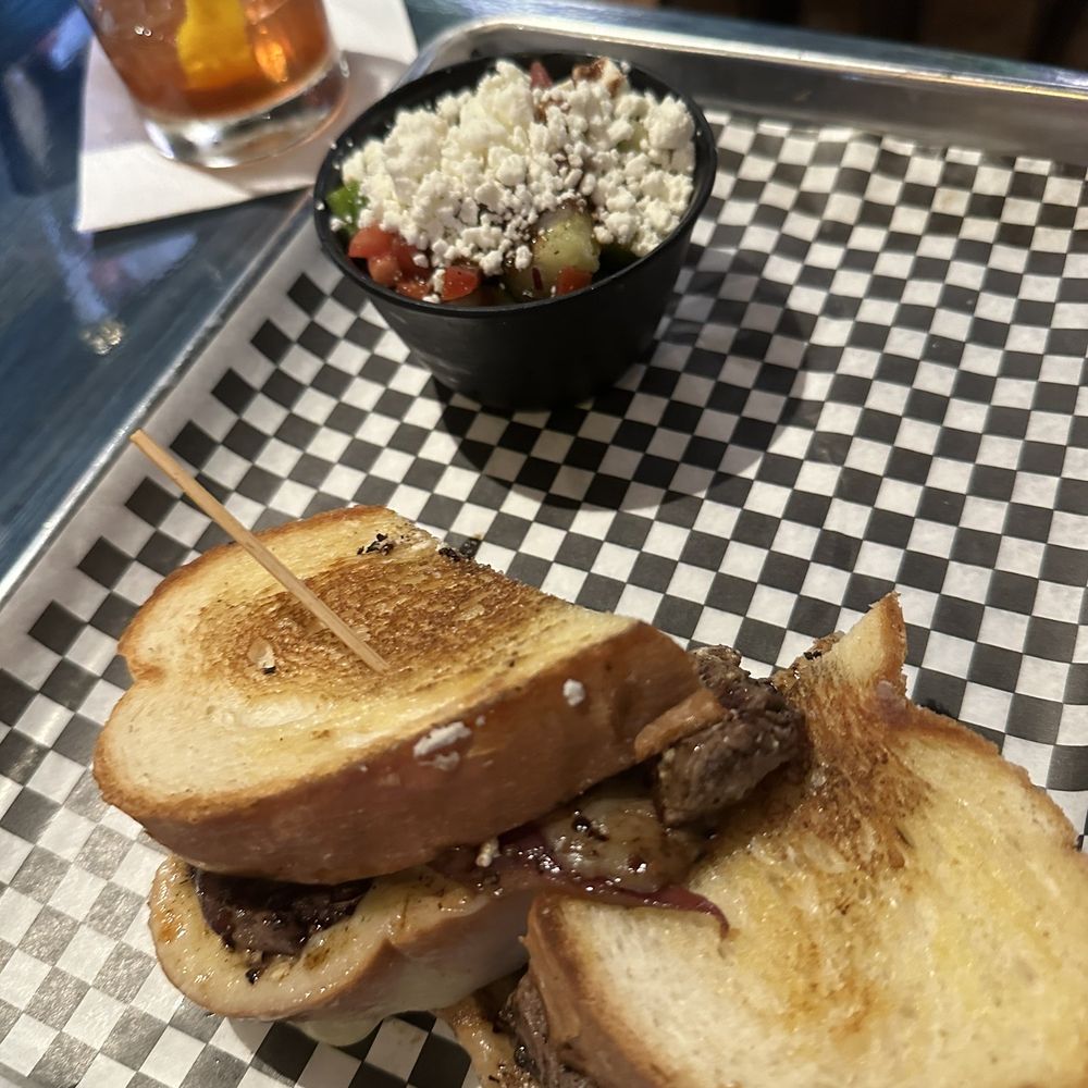 Spliff's Gastropub - Steak sandwich with side of tomato salad - Beverage Store Near Me - Jacksonville, Florida Spliff's Gastropub - Steak sandwich with side of tomato salad - Beverage Store Near Me - Jacksonville, Florida