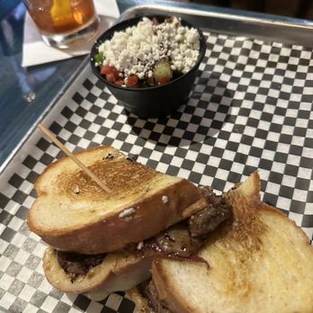 Spliff's Gastropub - Steak sandwich with side of tomato salad - Beverage Store Near Me - Jacksonville, Florida Spliff's Gastropub - Steak sandwich with side of tomato salad - Beverage Store Near Me - Jacksonville, Florida