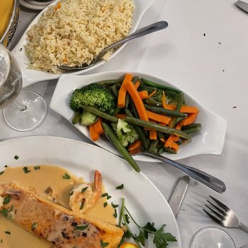 Lisbon Cafe - Salmon with champagne sauce. - Portuguese Near Me - Jericho, New York Lisbon Cafe - Salmon with champagne sauce. - Portuguese Near Me - Jericho, New York