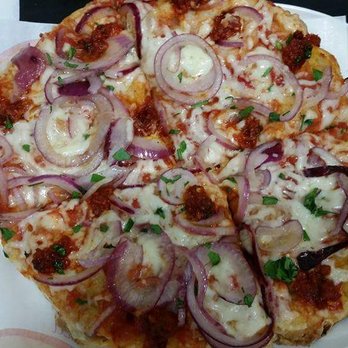 Pinsere - One of the 2 we ate.... can't remember all the toppings but had onions and a sauce with a really nice spicy kick to it. - Pizza Near Me - Rome, RM Pinsere - One of the 2 we ate.... can't remember all the toppings but had onions and a sauce with a really nice spicy kick to it. - Pizza Near Me - Rome, RM