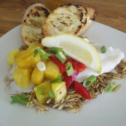 Beach Road Wine Bar & Bistro - Poached Bassa on a bed of Teriyaki orzo topped with pineapple, roasted reds, green onions and finished with reduced saki