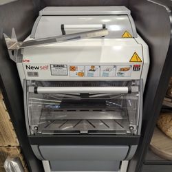 Safeway - publicly available bread slicing machine