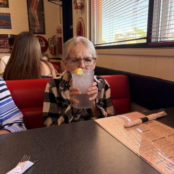 Weck's - My petite, but fabulously feisty, aunt holding a "big kid" cup. - Breakfast & Brunch Near Me - Los Lunas, New Mexico Weck's - My petite, but fabulously feisty, aunt holding a "big kid" cup. - Breakfast & Brunch Near Me - Los Lunas, New Mexico