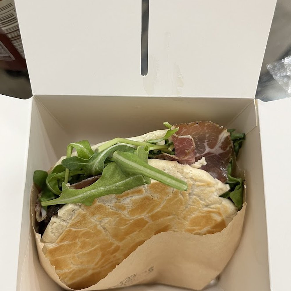 Sapore D'Italia - coppa wit creamy stracchino, arugula, tomato, and rich truffle cream Sapore D'Italia - coppa wit creamy stracchino, arugula, tomato, and rich truffle cream