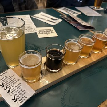 Lost Coast Brewery and Cafe - Flight and a Sharkinator IPA in the glass - Pubs Near Me - Eureka, California