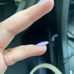 Uneven and messy polish job, nails lifting from the tip, HORRIBLE cuticle job!