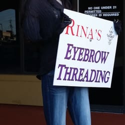Rina's Eyebrow Threading - Sign outside location. Rina is not there right now due to maternity leave.