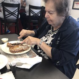 Your gorgeous date enjoying her cinnamon raisin French toast. Your gorgeous date enjoying her cinnamon raisin French toast.