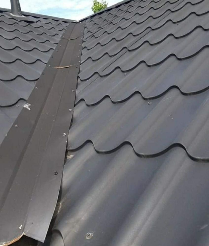 Slide of Acadiana Roofing