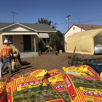 RVR Lawn Care - man standing in front of a house - Irrigation Near Me RVR Lawn Care - man standing in front of a house - Irrigation Near Me