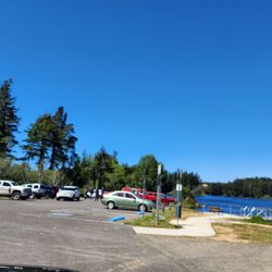 John Topits Park - There's plenty of parking.  Didn't see one homeless person.  Paved trail with lots of shade. It was lovely!!