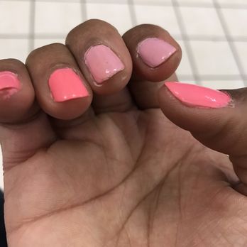 Solar Nails and Spa - The light pink is the first time they did my nails. Please tell me how her painting my cuticles is my fault. Horrible job - Day Spas Near Me - Klamath Falls, Oregon