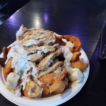 SweetHeart’s Chicks & Shakes - Chicken Poutine. Not quite Canadian, but quite good for this far from the border. I like it! - Ice Cream & Frozen Yogurt Near Me - North Bend, Oregon SweetHeart’s Chicks & Shakes - Chicken Poutine. Not quite Canadian, but quite good for this far from the border. I like it! - Ice Cream & Frozen Yogurt Near Me - North Bend, Oregon
