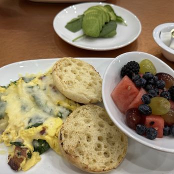Another Broken Egg Cafe - Spinach omelette with fruit and additional side of avocado - Breakfast & Brunch Near Me - Houston, Texas