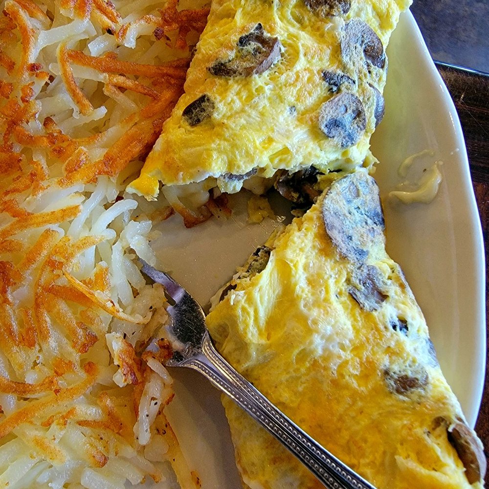 Lakewood Cafe - Wild Mushrooms & Swiss Cheese 3 egg omelet $11.24 with hashbrowned potatos ( 4 options for sides ) Very flavorful & filling - Breakfast & Brunch Near Me - Rowlett, Texas Lakewood Cafe - Wild Mushrooms & Swiss Cheese 3 egg omelet $11.24 with hashbrowned potatos ( 4 options for sides ) Very flavorful & filling - Breakfast & Brunch Near Me - Rowlett, Texas