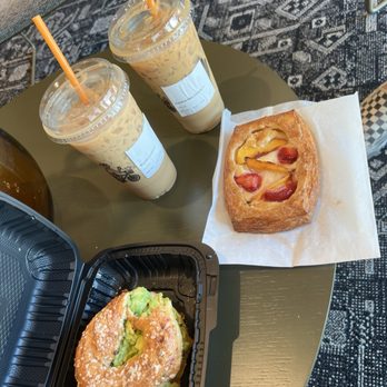 Window Coffee Bar - Iced Burnt cream latte, iced cookie macchiato (stirred), avocado on jalapeño cheddar bagel w/chili flakes, fruit & cheese danish - Coffee & Tea Near Me - Tempe, Arizona Window Coffee Bar - Iced Burnt cream latte, iced cookie macchiato (stirred), avocado on jalapeño cheddar bagel w/chili flakes, fruit & cheese danish - Coffee & Tea Near Me - Tempe, Arizona
