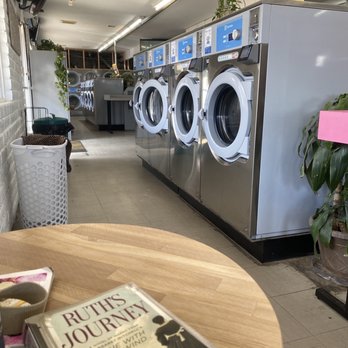 Super Clean Laundry - 50 lb machines along the front of the laundromat. Sitting at one of the tables to write this review :-) Even the lighting in here is great! - Laundromat Near Me - Cottonwood, Arizona