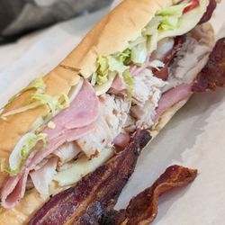 Compliments Only - They have a name for this but I forgot what it is. Ham and turkey club basically
