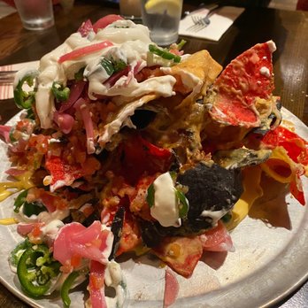 Guy Fieri's Mt. Pocono Kitchen - Trash can nachos with pulled pork - American Near Me - Mount Pocono, Pennsylvania Guy Fieri's Mt. Pocono Kitchen - Trash can nachos with pulled pork - American Near Me - Mount Pocono, Pennsylvania